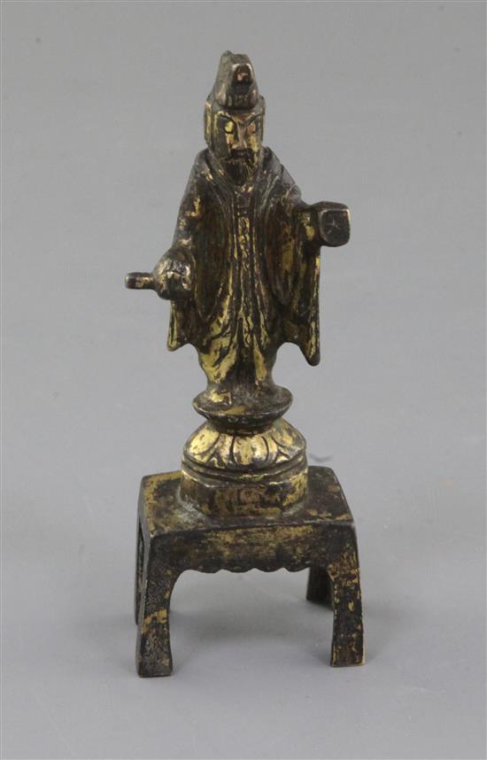 A small Chinese gilt bronze figure of a Daoist deity possibly Yuanshi Tianzun, Tang dynasty (AD 618-907), h. 11cm
